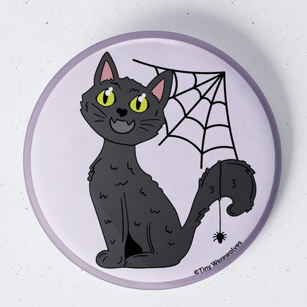 Based in Chicago by queer artist & designer Kayla Pekkala - Tiny Werewolves | Black Cat Spooky 1.75" Button Pin in | Shop to get your Metal Pinback Button with collections featuring retro-inspired designs infused with social commentary art, highlighting modern social & current events.
