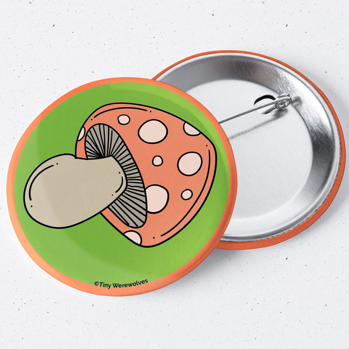 Based in Chicago by queer artist & designer Kayla Pekkala - Tiny Werewolves | Mushroom 1.75" Button Pin in | Shop to get your Metal Pinback Button with collections featuring retro-inspired designs infused with social commentary art, highlighting modern social & current events.
