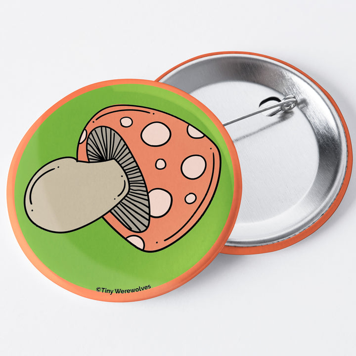Based in Chicago by queer artist & designer Kayla Pekkala - Tiny Werewolves | Mushroom 1.75" Button Pin in | Shop to get your Metal Pinback Button with collections featuring retro-inspired designs infused with social commentary art, highlighting modern social & current events.