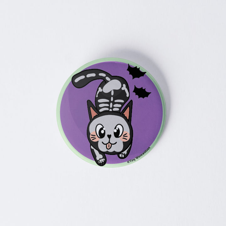 Based in Chicago by queer artist & designer Kayla Pekkala - Tiny Werewolves | SkeliCat Spooky 1" Mini Button Pin in | Shop to get your Metal Pinback Button with collections featuring retro-inspired designs infused with social commentary art, highlighting modern social & current events.