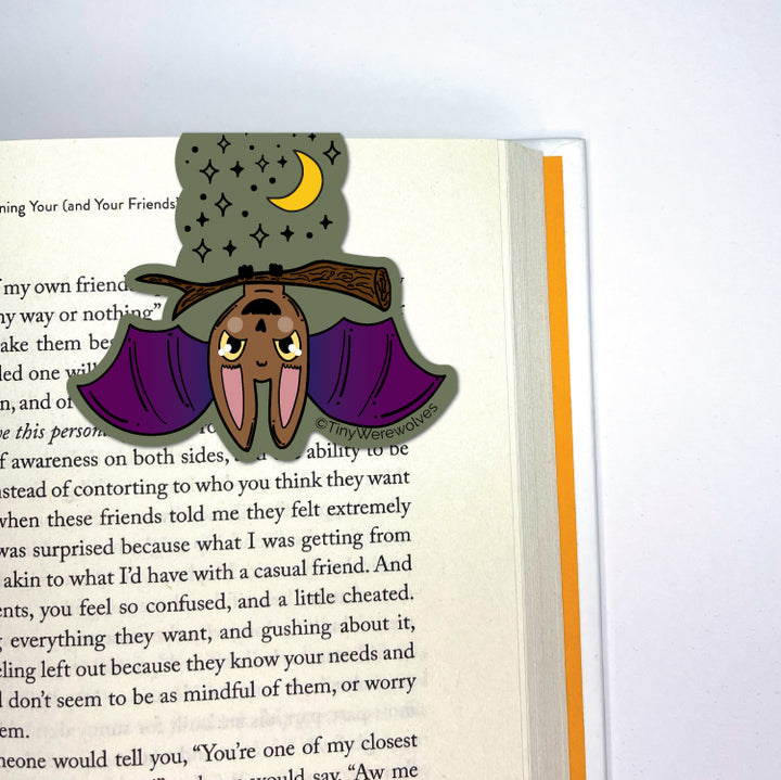 Based in Chicago by queer artist & designer Kayla Pekkala - Tiny Werewolves | Bat Spooky Laminated Magnetic Bookmark in | Shop to get your Magnetic Bookmark with collections featuring retro-inspired designs infused with social commentary art, highlighting modern social & current events.