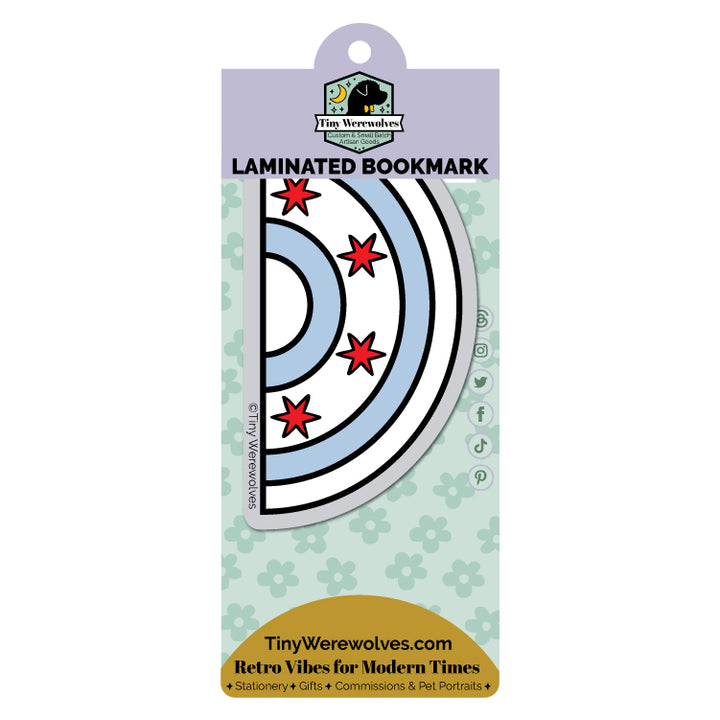 Based in Chicago by queer artist & designer Kayla Pekkala - Tiny Werewolves | Chicago Flag Arched Rainbow Laminated Printed Bookmark in | Shop to get your Laminated Bookmark with collections featuring retro-inspired designs infused with social commentary art, highlighting modern social & current events.