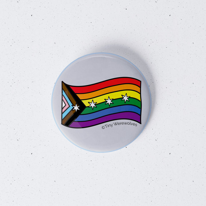 Based in Chicago by queer artist & designer Kayla Pekkala - Tiny Werewolves | Chicago Progressive Rainbow Pride 1" Mini Button Pin in | Shop to get your Metal Pinback Button with collections featuring retro-inspired designs infused with social commentary art, highlighting modern social & current events.