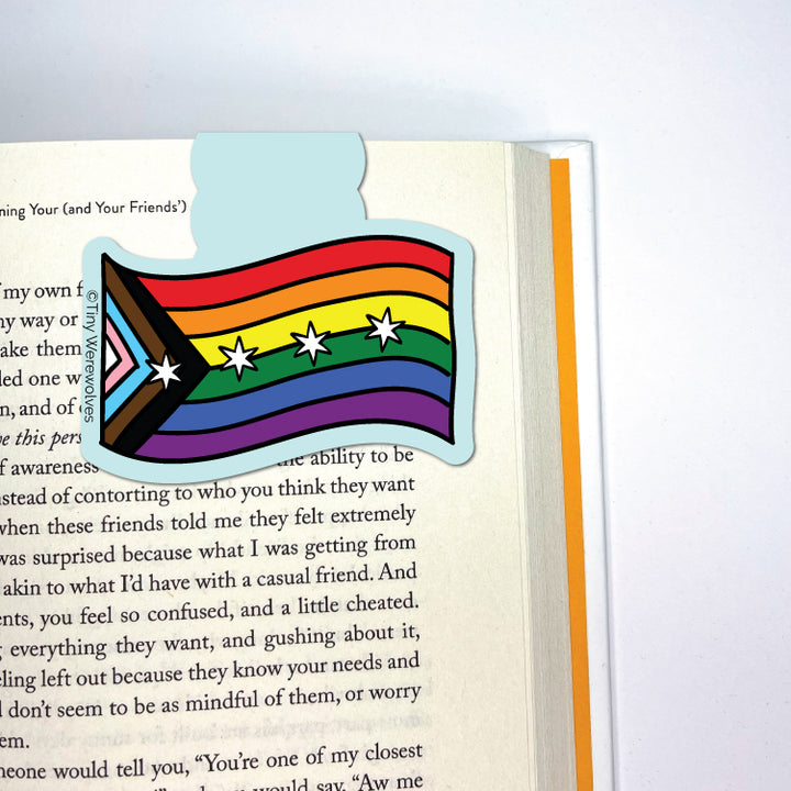 Based in Chicago by queer artist & designer Kayla Pekkala - Tiny Werewolves | Chicago Progressive Rainbow Pride Flag Laminated Magnetic Bookmark in | Shop to get your Magnetic Bookmark with collections featuring retro-inspired designs infused with social commentary art, highlighting modern social & current events.