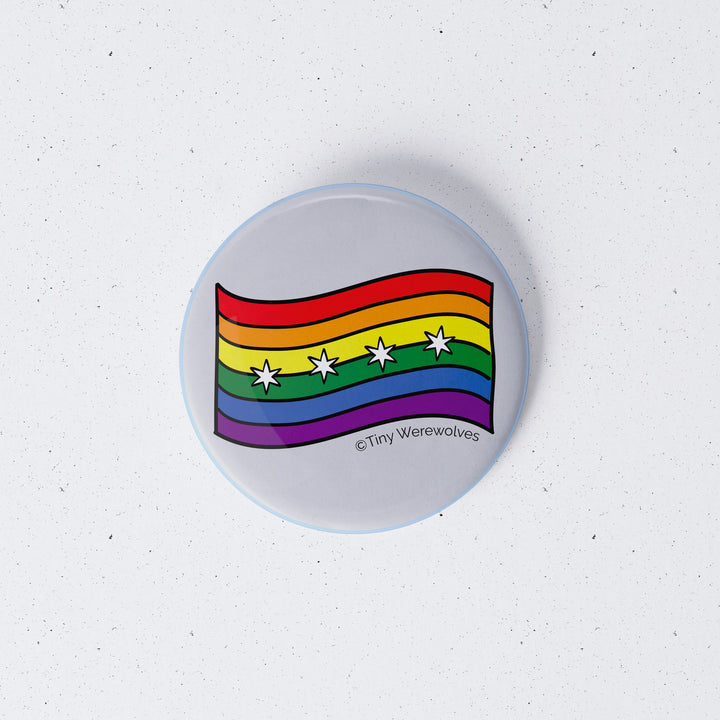 Based in Chicago by queer artist & designer Kayla Pekkala - Tiny Werewolves | Chicago Rainbow Pride Flag 1" Mini Button Pin in | Shop to get your Metal Pinback Button with collections featuring retro-inspired designs infused with social commentary art, highlighting modern social & current events.