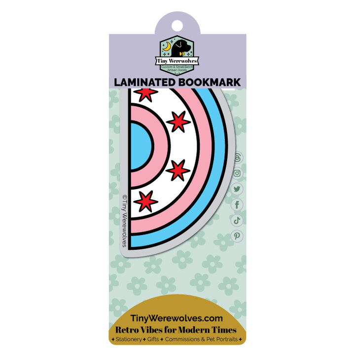 Based in Chicago by queer artist & designer Kayla Pekkala - Tiny Werewolves | Chicago Trans Flag Arched Rainbow Laminated Printed Bookmark in | Shop to get your Laminated Bookmark with collections featuring retro-inspired designs infused with social commentary art, highlighting modern social & current events.