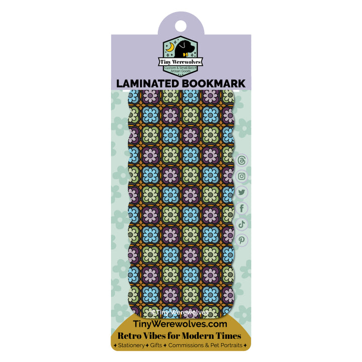 Based in Chicago by queer artist & designer Kayla Pekkala - Tiny Werewolves | Granny Square Laminated Printed Bookmark in | Shop to get your Laminated Bookmark with collections featuring retro-inspired designs infused with social commentary art, highlighting modern social & current events.