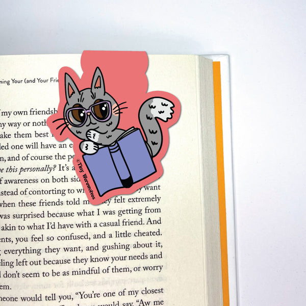 Based in Chicago by queer artist & designer Kayla Pekkala - Tiny Werewolves | Grey Book Cat Laminated Magnetic Bookmark in | Shop to get your Magnetic Bookmark with collections featuring retro-inspired designs infused with social commentary art, highlighting modern social & current events.
