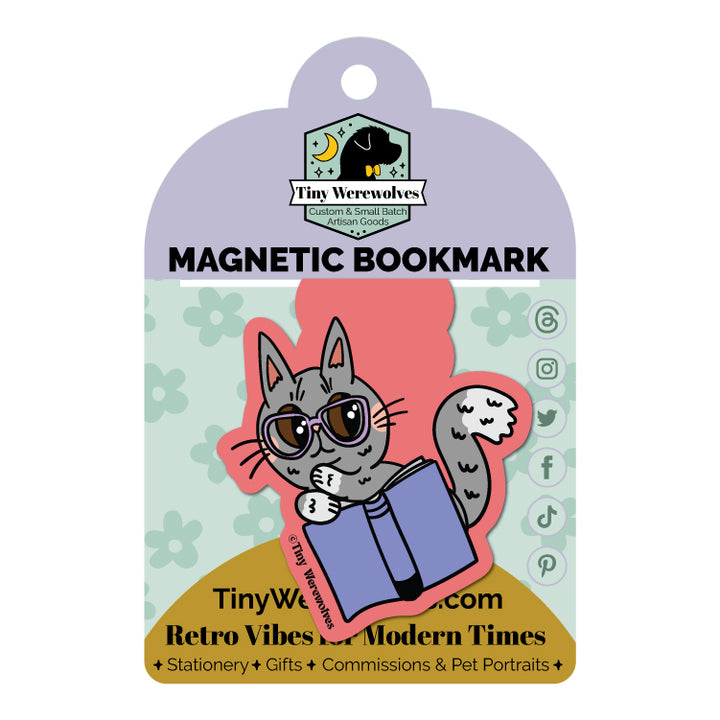 Based in Chicago by queer artist & designer Kayla Pekkala - Tiny Werewolves | Grey Book Cat Laminated Magnetic Bookmark in | Shop to get your Magnetic Bookmark with collections featuring retro-inspired designs infused with social commentary art, highlighting modern social & current events.