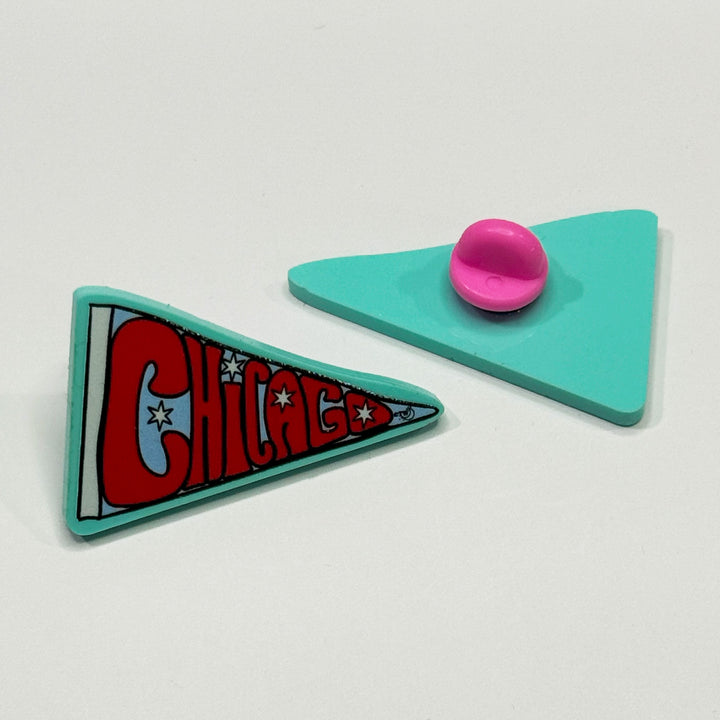 Based in Chicago by queer artist & designer Kayla Pekkala - Tiny Werewolves | Chicago Pennant Acrylic Pin in | Shop to get your Acrylic Pin with collections featuring retro-inspired designs infused with social commentary art, highlighting modern social & current events.