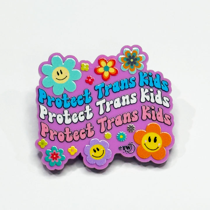 Based in Chicago by queer artist & designer Kayla Pekkala - Tiny Werewolves | Retro Flowers Protect Trans Kids Acrylic Pin in Bubblegum Pink | Shop to get your Acrylic Pin with collections featuring retro-inspired designs infused with social commentary art, highlighting modern social & current events.