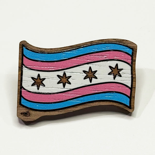 Based in Chicago by queer artist & designer Kayla Pekkala - Tiny Werewolves | Chicago Transgender Pride Flag Wood Pin in Walnut | Shop to get your Wood Pin with collections featuring retro-inspired designs infused with social commentary art, highlighting modern social & current events.