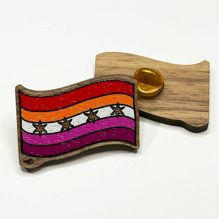 Based in Chicago by queer artist & designer Kayla Pekkala - Tiny Werewolves | Chicago Lesbian Pride Flag Wood Pin in | Shop to get your Wood Pin with collections featuring retro-inspired designs infused with social commentary art, highlighting modern social & current events.