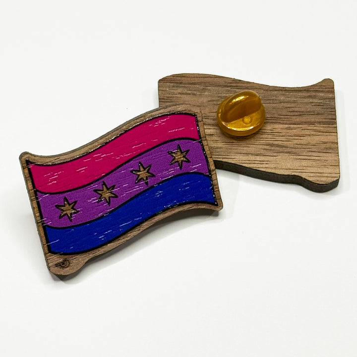 Based in Chicago by queer artist & designer Kayla Pekkala - Tiny Werewolves | Chicago Bisexual Pride Flag Wood Pin in | Shop to get your Wood Pin with collections featuring retro-inspired designs infused with social commentary art, highlighting modern social & current events.