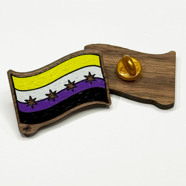 Based in Chicago by queer artist & designer Kayla Pekkala - Tiny Werewolves | Chicago Non-Binary Pride Flag Wood Pin in | Shop to get your Wood Pin with collections featuring retro-inspired designs infused with social commentary art, highlighting modern social & current events.