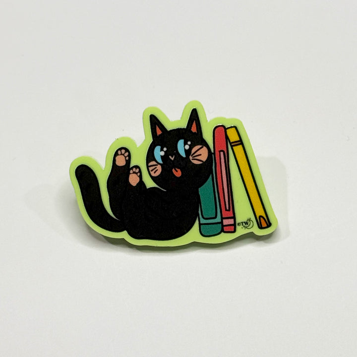 Based in Chicago by queer artist & designer Kayla Pekkala - Tiny Werewolves | Black Book Cat Acrylic Pin in Lime | Shop to get your Acrylic Pin with collections featuring retro-inspired designs infused with social commentary art, highlighting modern social & current events.
