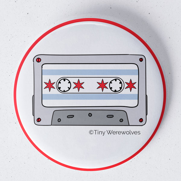 Based in Chicago by queer artist & designer Kayla Pekkala - Tiny Werewolves | Chicago Flag Cassette Tape 1.75" Button Pin in | Shop to get your Metal Pinback Button with collections featuring retro-inspired designs infused with social commentary art, highlighting modern social & current events.
