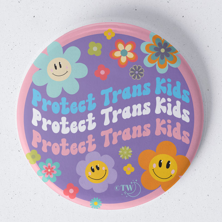 Based in Chicago by queer artist & designer Kayla Pekkala - Tiny Werewolves | Retro Flower Protect Trans Kids 1.75" Button Pin in | Shop to get your Metal Pinback Button with collections featuring retro-inspired designs infused with social commentary art, highlighting modern social & current events.