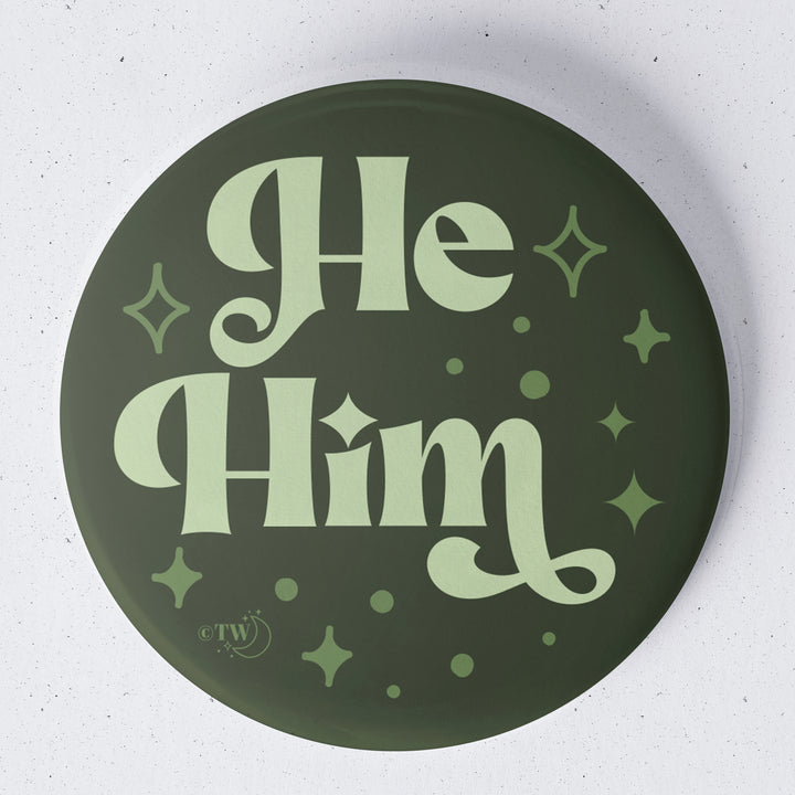 Based in Chicago by queer artist & designer Kayla Pekkala - Tiny Werewolves | He / Him Pronouns Retro Stars 1.75" Button Pin in | Shop to get your Metal Pinback Button with collections featuring retro-inspired designs infused with social commentary art, highlighting modern social & current events.