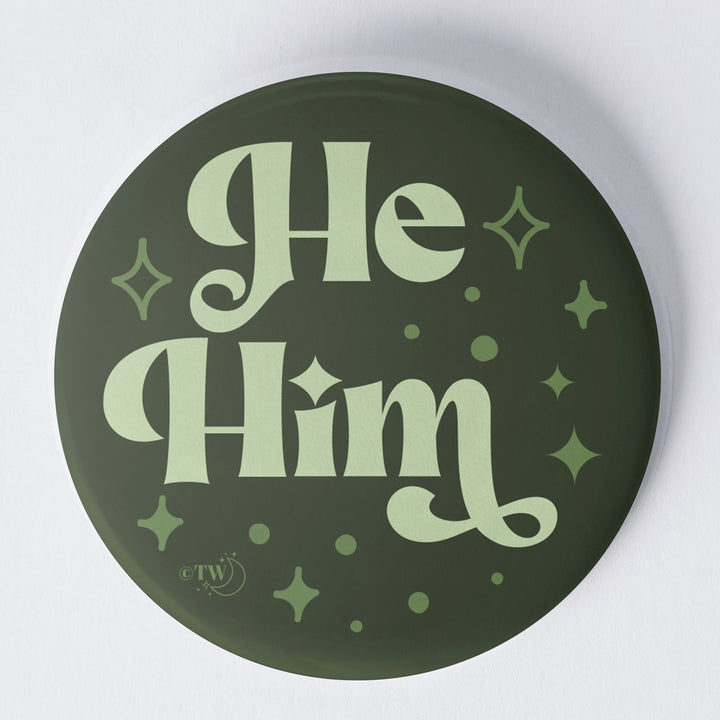 Based in Chicago by queer artist & designer Kayla Pekkala - Tiny Werewolves | He / Him Pronouns Retro Stars 1.75" Button Pin in | Shop to get your Metal Pinback Button with collections featuring retro-inspired designs infused with social commentary art, highlighting modern social & current events.