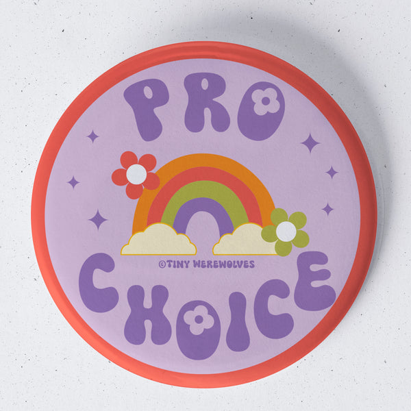 Based in Chicago by queer artist & designer Kayla Pekkala - Tiny Werewolves | Pro Choice 1.75" Button Pin in | Shop to get your Metal Pinback Button with collections featuring retro-inspired designs infused with social commentary art, highlighting modern social & current events.