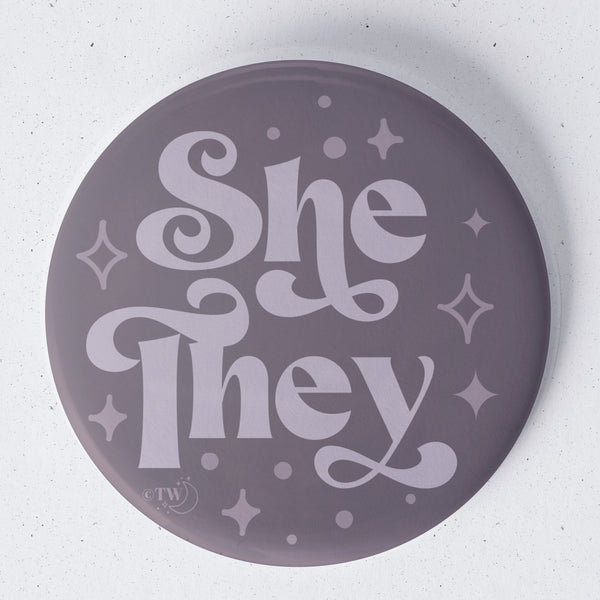 Based in Chicago by queer artist & designer Kayla Pekkala - Tiny Werewolves | She / They Pronouns Retro Stars 1.75" Button Pin in | Shop to get your Metal Pinback Button with collections featuring retro-inspired designs infused with social commentary art, highlighting modern social & current events.