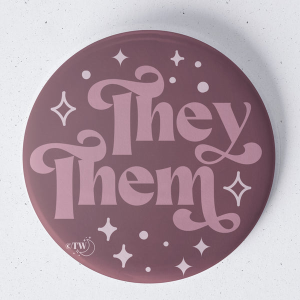 Based in Chicago by queer artist & designer Kayla Pekkala - Tiny Werewolves | They / Them Pronouns Retro Stars 1.75" Button Pin in | Shop to get your Metal Pinback Button with collections featuring retro-inspired designs infused with social commentary art, highlighting modern social & current events.