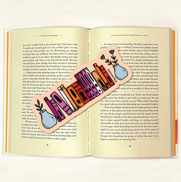Based in Chicago by queer artist & designer Kayla Pekkala - Tiny Werewolves | Lesbian Bookshelf Pride Laminated Printed Bookmark in | Shop to get your Laminated Bookmark with collections featuring retro-inspired designs infused with social commentary art, highlighting modern social & current events.