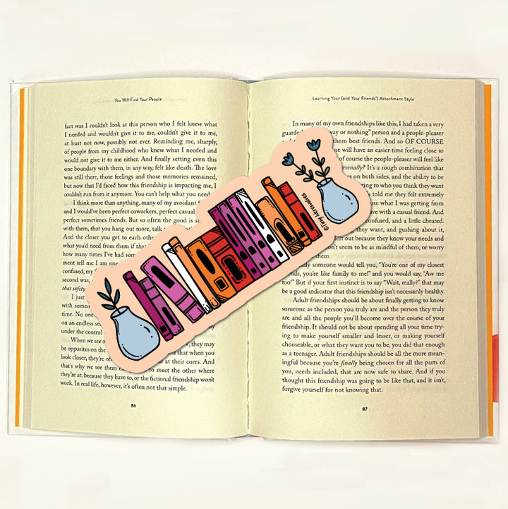 Based in Chicago by queer artist & designer Kayla Pekkala - Tiny Werewolves | Lesbian Bookshelf Pride Laminated Printed Bookmark in | Shop to get your Laminated Bookmark with collections featuring retro-inspired designs infused with social commentary art, highlighting modern social & current events.