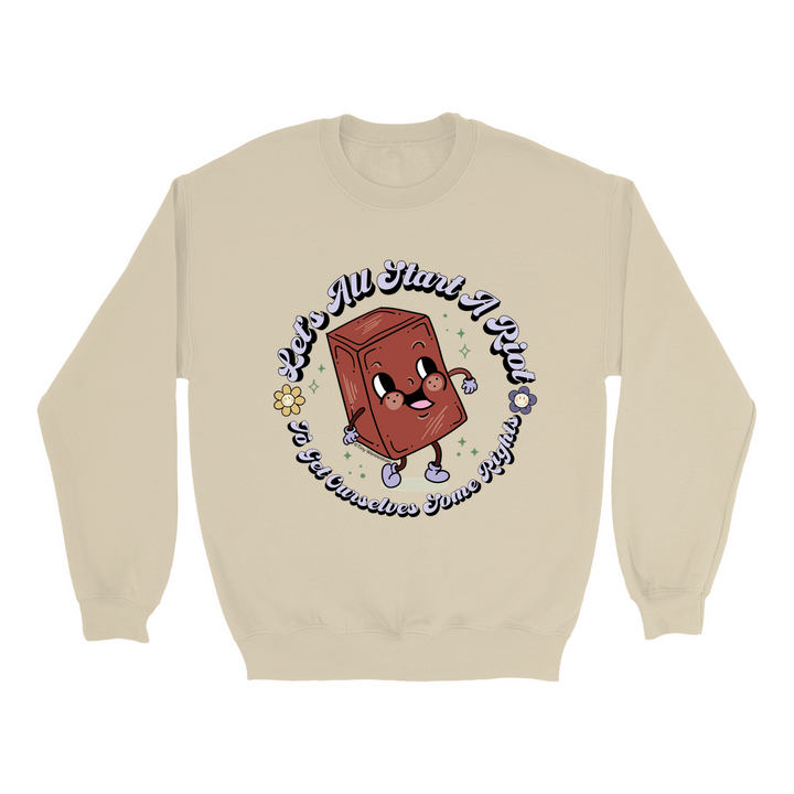 Based in Chicago by queer artist & designer Kayla Pekkala - Tiny Werewolves | Let's All Start A Riot Crew Sweatshirt in Sand | Shop to get your Crew with collections featuring retro-inspired designs infused with social commentary art, highlighting modern social & current events.