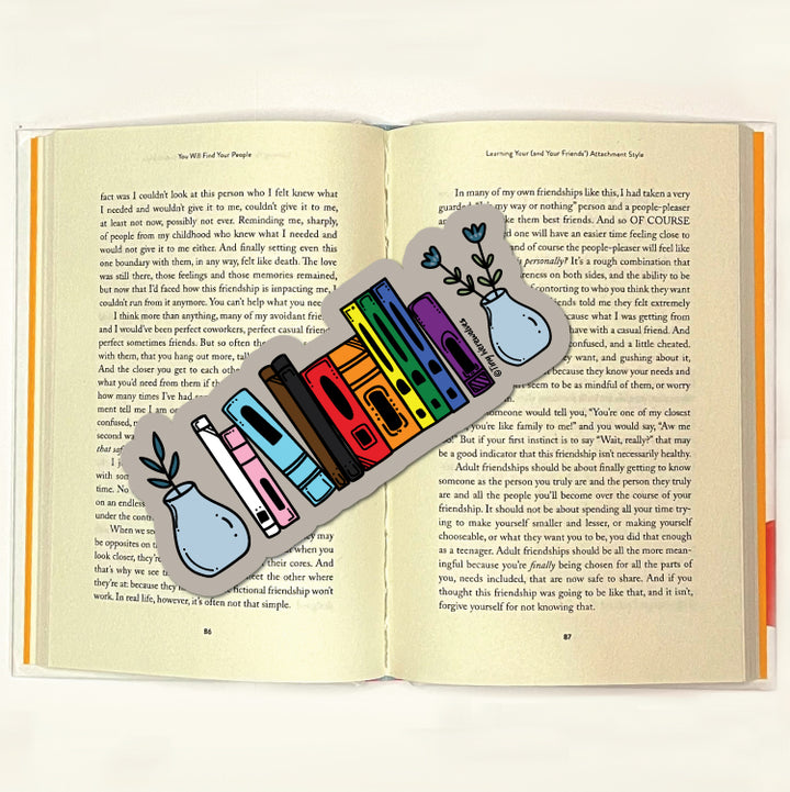 Based in Chicago by queer artist & designer Kayla Pekkala - Tiny Werewolves | Progressive Bookshelf Pride Laminated Printed Bookmark in | Shop to get your Laminated Bookmark with collections featuring retro-inspired designs infused with social commentary art, highlighting modern social & current events.