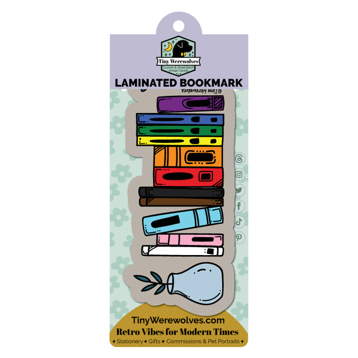 Based in Chicago by queer artist & designer Kayla Pekkala - Tiny Werewolves | Progressive Bookshelf Pride Laminated Printed Bookmark in | Shop to get your Laminated Bookmark with collections featuring retro-inspired designs infused with social commentary art, highlighting modern social & current events.