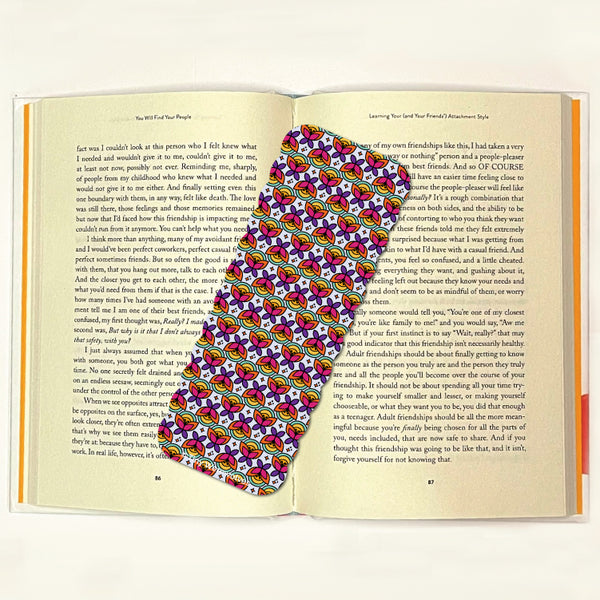 Based in Chicago by queer artist & designer Kayla Pekkala - Tiny Werewolves | Retro Butterfly Laminated Printed Bookmark in | Shop to get your Laminated Bookmark with collections featuring retro-inspired designs infused with social commentary art, highlighting modern social & current events.