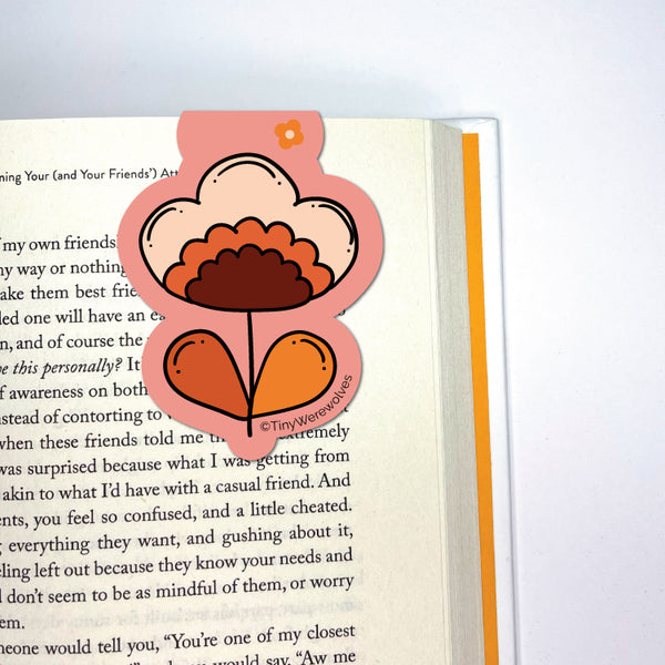 Based in Chicago by queer artist & designer Kayla Pekkala - Tiny Werewolves | Retro Flower Laminated Magnetic Bookmark in | Shop to get your Magnetic Bookmark with collections featuring retro-inspired designs infused with social commentary art, highlighting modern social & current events.