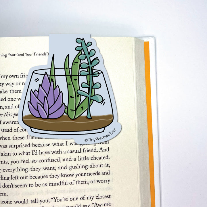 Based in Chicago by queer artist & designer Kayla Pekkala - Tiny Werewolves | Succulent Laminated Magnetic Bookmark in | Shop to get your Magnetic Bookmark with collections featuring retro-inspired designs infused with social commentary art, highlighting modern social & current events.