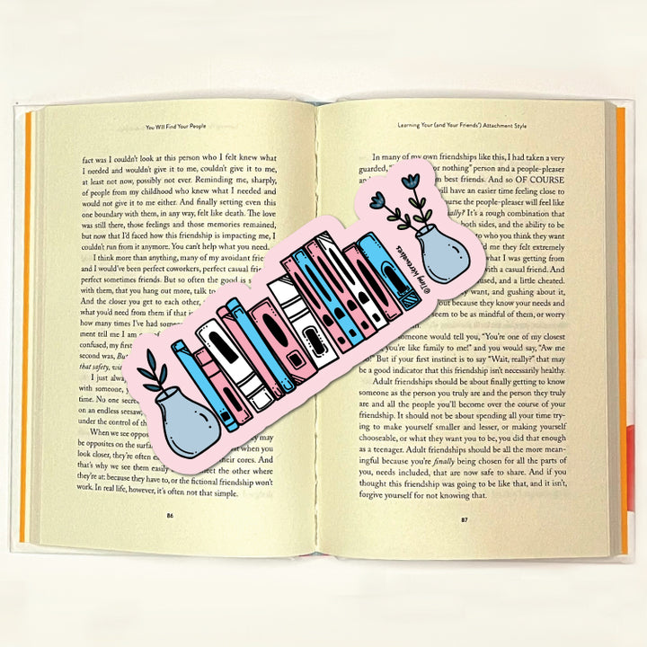 Based in Chicago by queer artist & designer Kayla Pekkala - Tiny Werewolves | Transgender Bookshelf Pride Laminated Printed Bookmark in | Shop to get your Laminated Bookmark with collections featuring retro-inspired designs infused with social commentary art, highlighting modern social & current events.