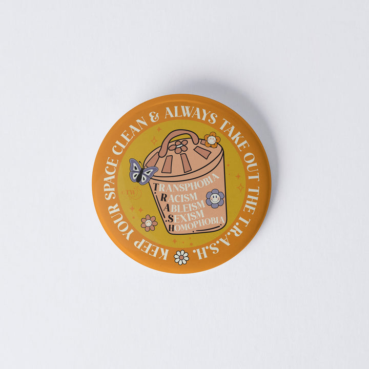 Based in Chicago by queer artist & designer Kayla Pekkala - Tiny Werewolves | Take Out The T.R.A.S.H. 1" Mini Button Pin in | Shop to get your Metal Pinback Button with collections featuring retro-inspired designs infused with social commentary art, highlighting modern social & current events.