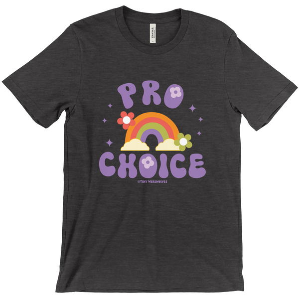 Based in Chicago by queer artist & designer Kayla Pekkala - Tiny Werewolves | Pro Choice Tee in | Shop to get your Tee with collections featuring retro-inspired designs infused with social commentary art, highlighting modern social & current events.