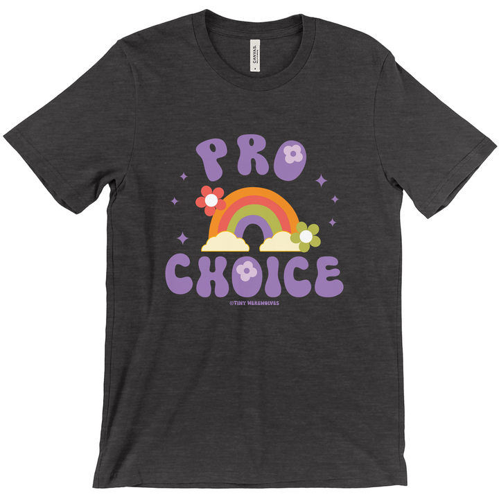 Based in Chicago by queer artist & designer Kayla Pekkala - Tiny Werewolves | Pro Choice Tee in | Shop to get your Tee with collections featuring retro-inspired designs infused with social commentary art, highlighting modern social & current events.