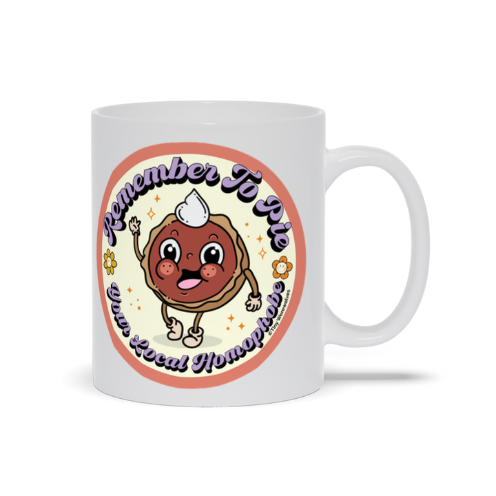 Based in Chicago by queer artist & designer Kayla Pekkala - Tiny Werewolves | Pie Your Local Homophobe Mug in 11 oz | Shop to get your Mug with collections featuring retro-inspired designs infused with social commentary art, highlighting modern social & current events.