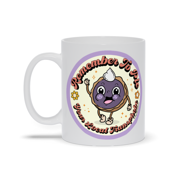 Based in Chicago by queer artist & designer Kayla Pekkala - Tiny Werewolves | Pie Your Local Transphobe Mug in | Shop to get your Mug with collections featuring retro-inspired designs infused with social commentary art, highlighting modern social & current events.