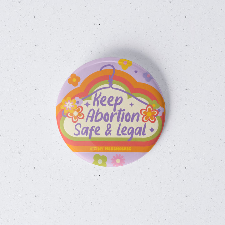 Based in Chicago by queer artist & designer Kayla Pekkala - Tiny Werewolves | Keep Abortion Safe & Legal 1" Mini Button Pin in | Shop to get your Metal Pinback Button with collections featuring retro-inspired designs infused with social commentary art, highlighting modern social & current events.