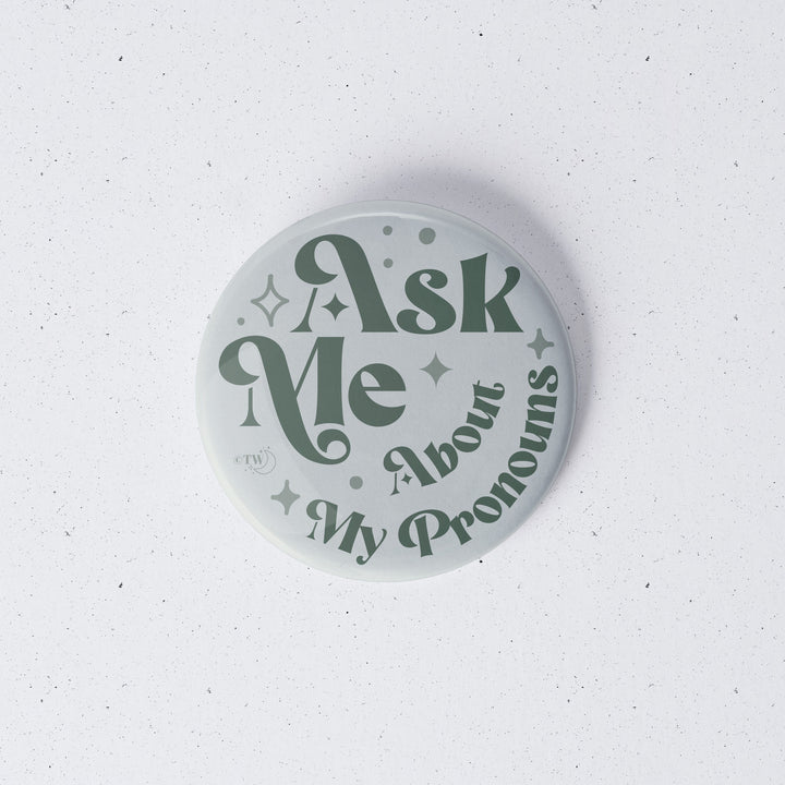 Based in Chicago by queer artist & designer Kayla Pekkala - Tiny Werewolves | Ask Me About My Pronouns Retro Stars 1" Mini Button Pin in | Shop to get your Metal Pinback Button with collections featuring retro-inspired designs infused with social commentary art, highlighting modern social & current events.