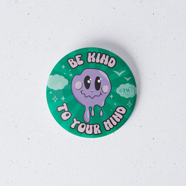Based in Chicago by queer artist & designer Kayla Pekkala - Tiny Werewolves | Be Kind To Your Mind 1" Mini Button Pin in | Shop to get your Metal Pinback Button with collections featuring retro-inspired designs infused with social commentary art, highlighting modern social & current events.