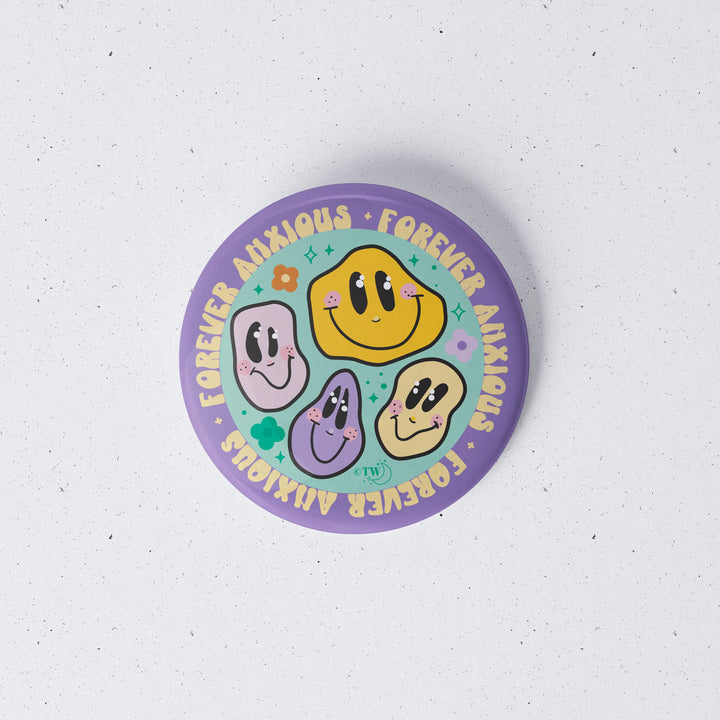 Based in Chicago by queer artist & designer Kayla Pekkala - Tiny Werewolves | Forever Anxious 1" Mini Button Pin in | Shop to get your Metal Pinback Button with collections featuring retro-inspired designs infused with social commentary art, highlighting modern social & current events.