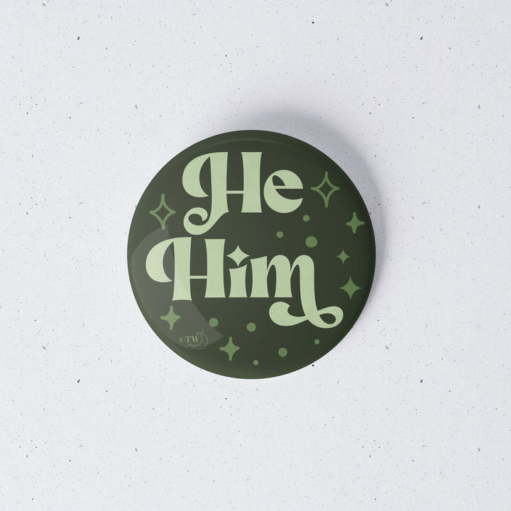 Based in Chicago by queer artist & designer Kayla Pekkala - Tiny Werewolves | He / Him Pronouns Retro Stars 1" Mini Button Pin in | Shop to get your Metal Pinback Button with collections featuring retro-inspired designs infused with social commentary art, highlighting modern social & current events.