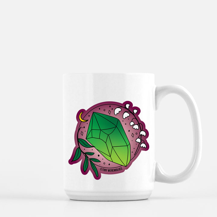 Based in Chicago by queer artist & designer Kayla Pekkala - Tiny Werewolves | May Crystal & Flower Birthstone Mug in 15 oz | Shop to get your Mug with collections featuring retro-inspired designs infused with social commentary art, highlighting modern social & current events.