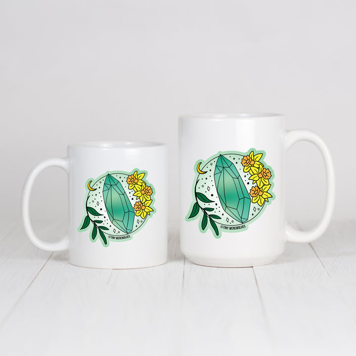 Based in Chicago by queer artist & designer Kayla Pekkala - Tiny Werewolves | March Crystal & Flower Birthstone Mug in | Shop to get your Mug with collections featuring retro-inspired designs infused with social commentary art, highlighting modern social & current events.