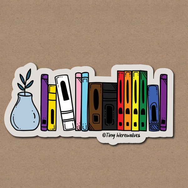 Based in Chicago by queer artist & designer Kayla Pekkala - Tiny Werewolves | Intersex-Inclusive Progress Bookshelf Pride Sticker in | Shop to get your Sticker with collections featuring retro-inspired designs infused with social commentary art, highlighting modern social & current events.