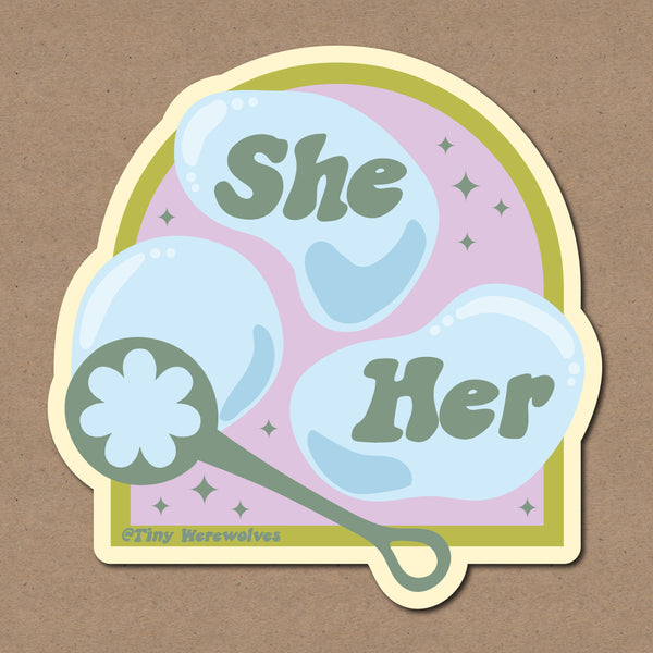 Based in Chicago by queer artist & designer Kayla Pekkala - Tiny Werewolves | She / Her Pronouns Bubble Sticker in | Shop to get your Sticker with collections featuring retro-inspired designs infused with social commentary art, highlighting modern social & current events.